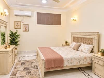 Daily Basis Apartment & Rooms Per day Perweek Short stay Available in E-11 Islamabad
