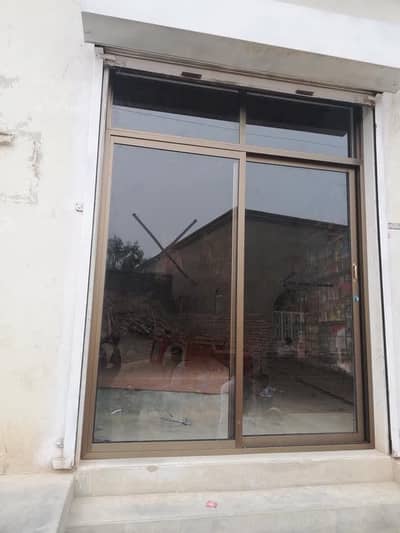 Shop Glass door size 6 foot chorra aur 7.6 foot oncha ha bilkul fresh