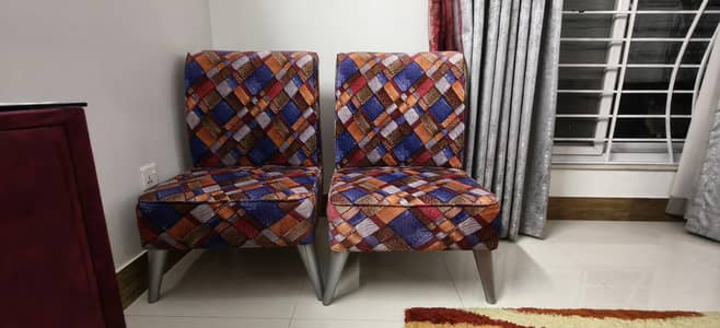 2 single seater sofas