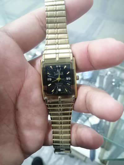 swistar gold tank watch