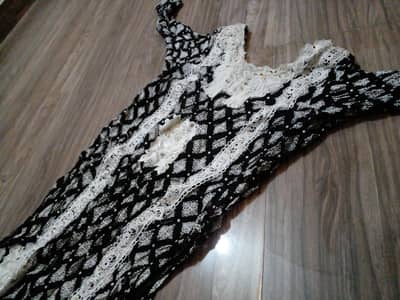 its embroidery black and white suite . its amazing fabric . embossing