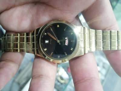 day date golden watch with japan movement