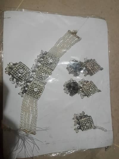 white and silver jewelry set