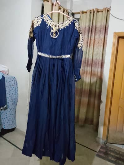 blue maxi with heavy embroidery on neck line and arms