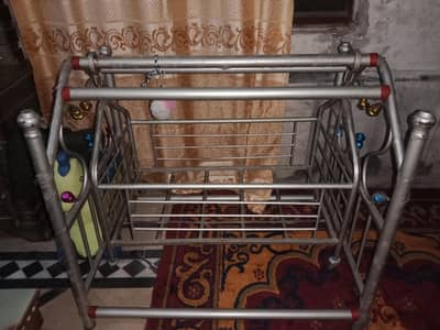 iron baby jula cradle with wheels