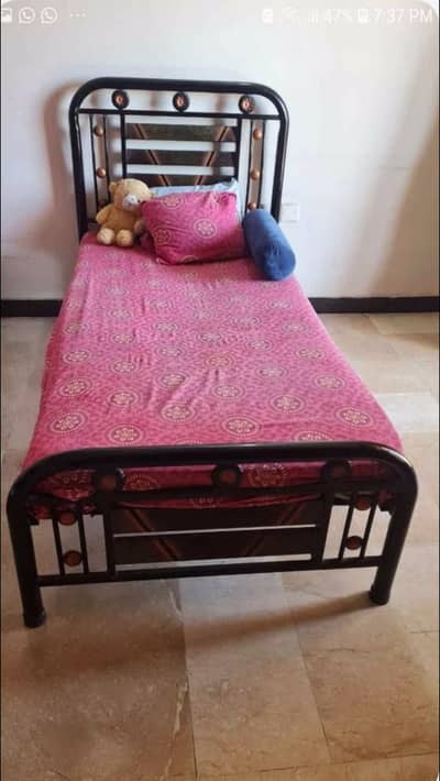 iron rod 2 single beds without mattress