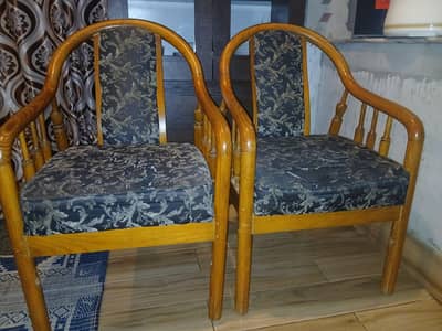 two diyar wood chairs