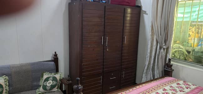 king size bed with sofa 2 side table and dressing table
