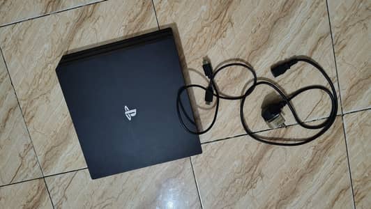PS4 pro for sale with 21 game and 4 controllers