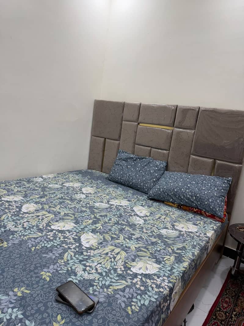 Bed and wardrobe 0
