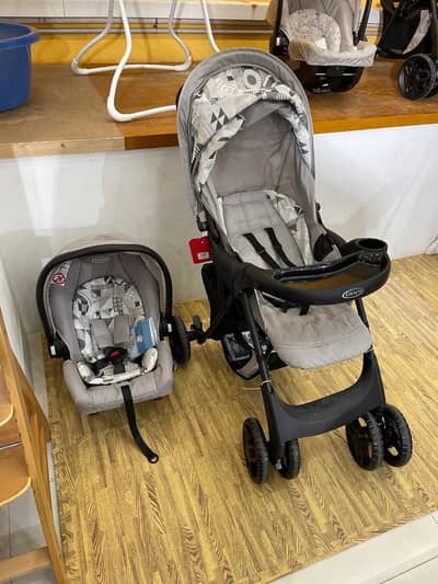 Bouncer and Pram unused Graco Zubaidas Company