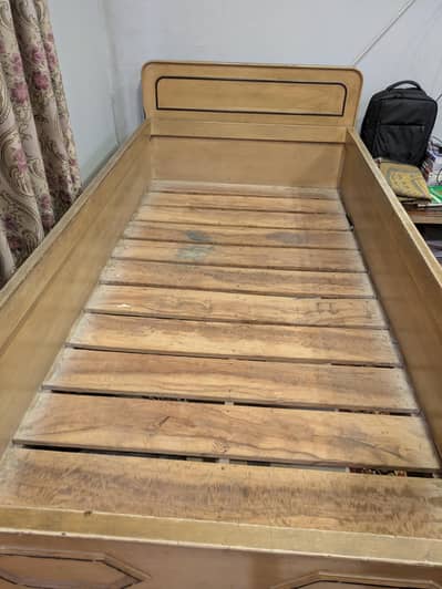 wooden single bed
