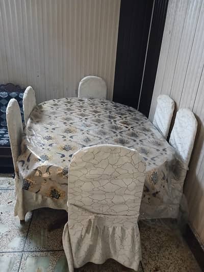Dining For sale Urgent with chairs & covers