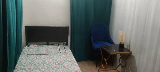 Small room available in G11/3 for lady