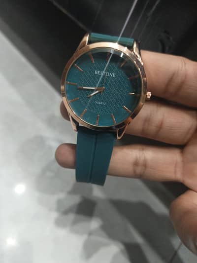 branded Watch with cyan dial and golden outer layer
