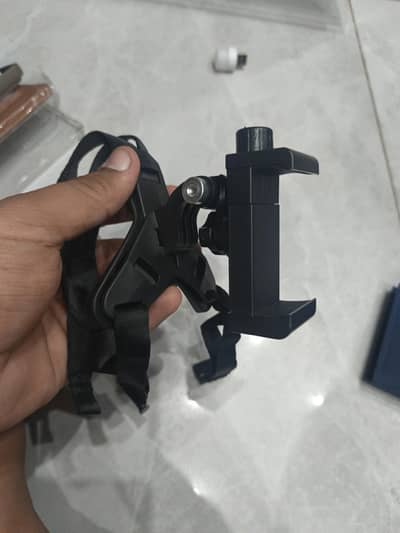 Bike helmet phone holder for recording