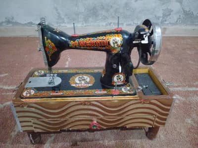 mehndi sewing machine 9/10 Ghar ki saaf machine  with box. urgent