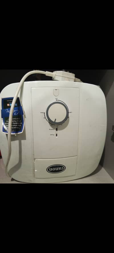 The image shows a Canon FEWH-LCM Series Fast Electric Water Heater (Ge