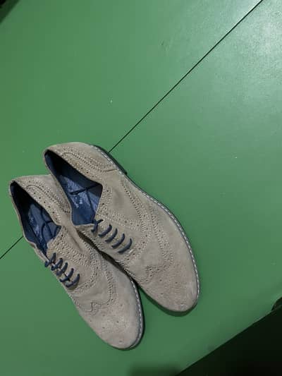 beige suede brogue-style Oxford shoe