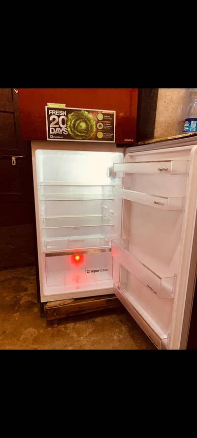 Dawlance refrigerator red color inverter excellent condition