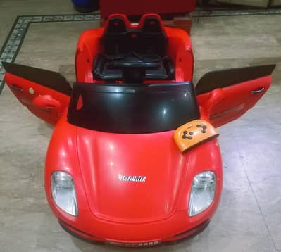 IMPORTED KIDS CAR with REMOTECONTROL & OPERABLE DOORS / All ok