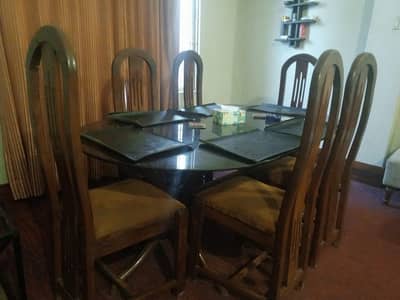 Glass top dining table with 6 chairs