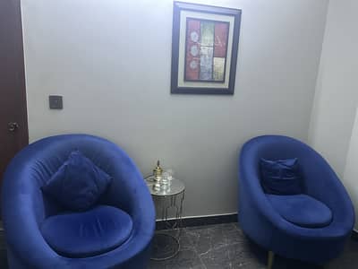 Blue colour sofas and small table