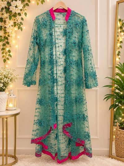 Elegant Teal Embroidered Net Frock with Pink Border