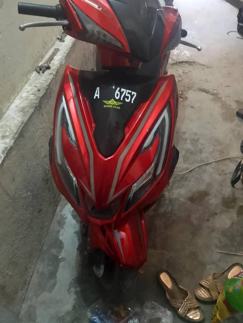 super star e scooty 8