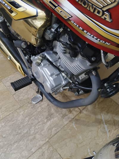 I am selling My Honda 125 gold edition nut to nut genuine
