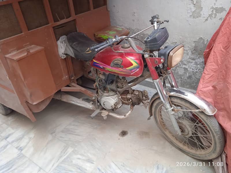 Motor cycle Riksha 9