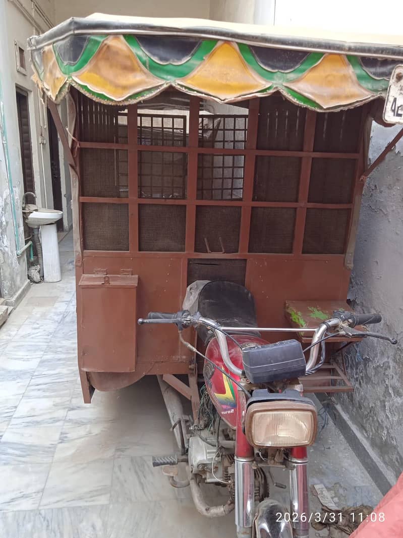Motor cycle Riksha 10