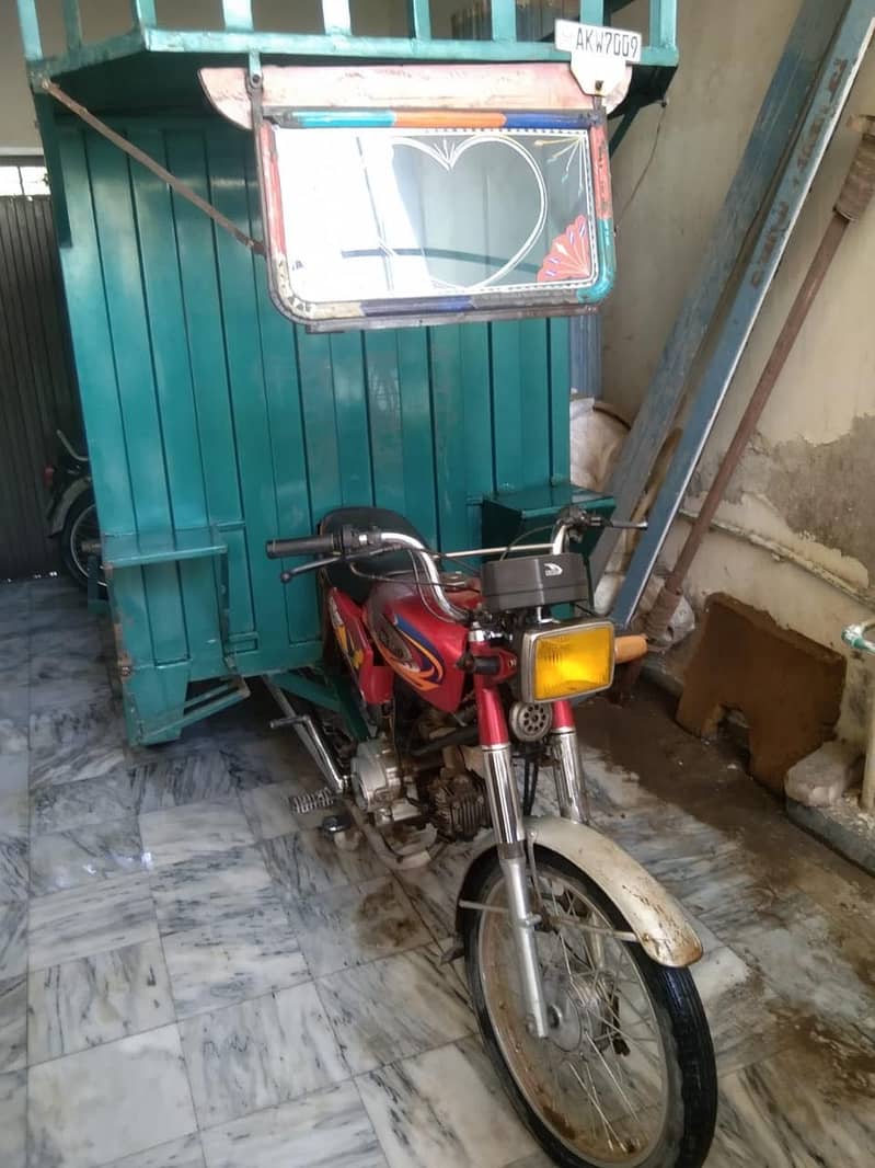 Motor cycle Riksha 18