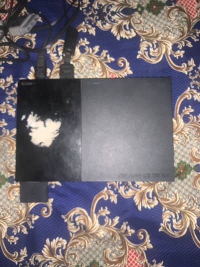 Play station 2 with 2 games no controller