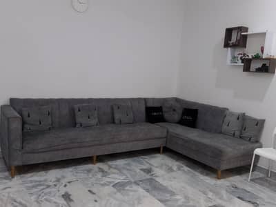 L shape gray soffa set on