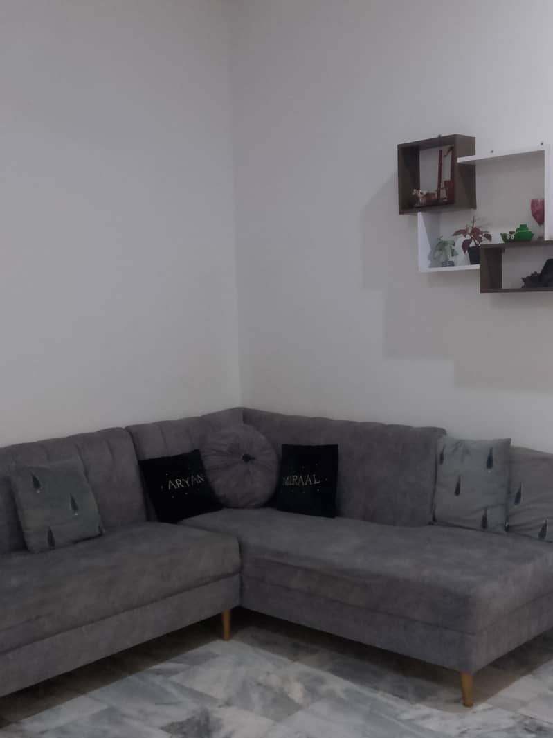 L shape gray soffa set on 1