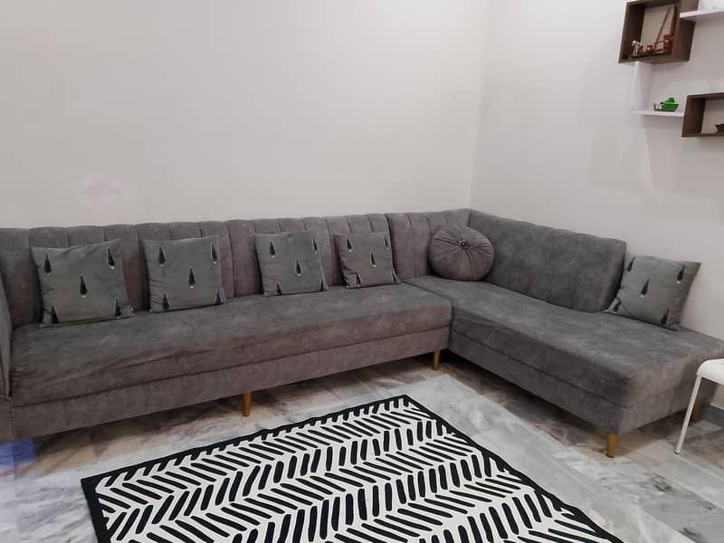 L shape gray soffa set on 4