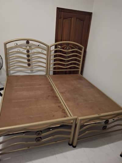 Single beds with side tables