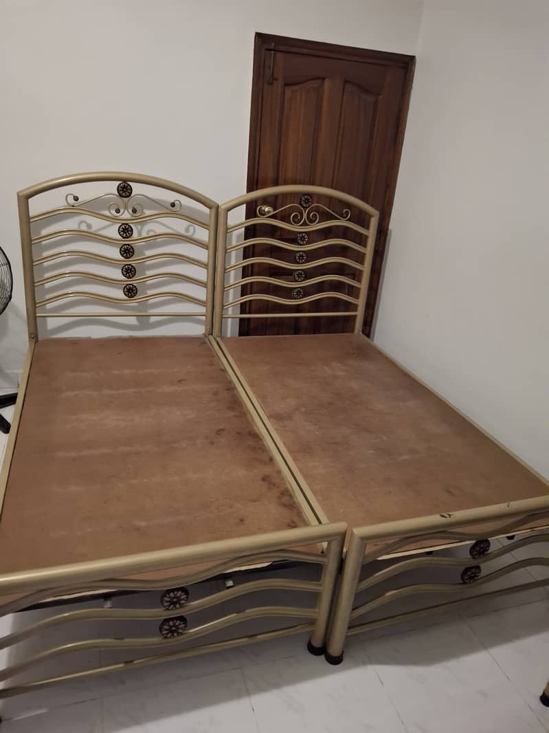 Single beds with side tables 0