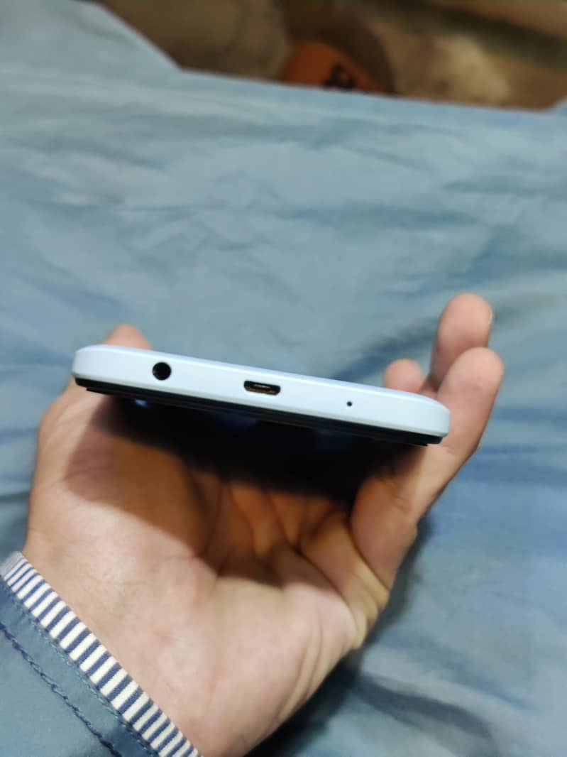 Redmi A2+ 3