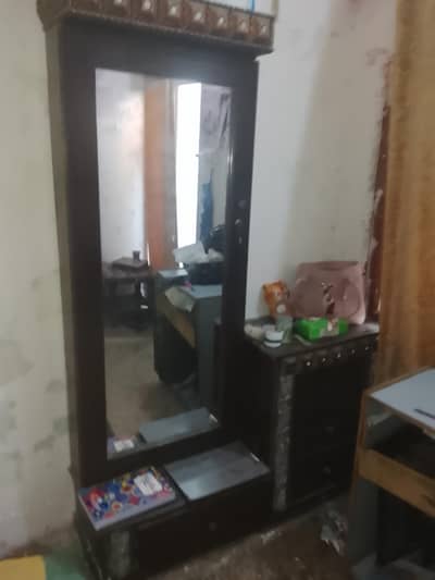 dressing and almari with double bed