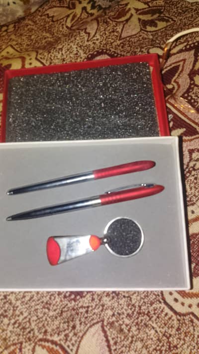 2 pen and 1 keychain