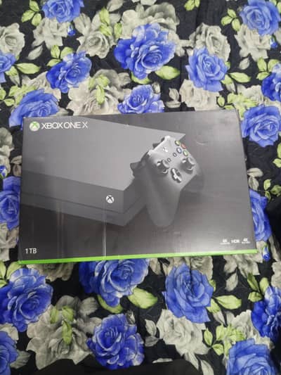 x box one x 1tb  and ps4 500gb with games