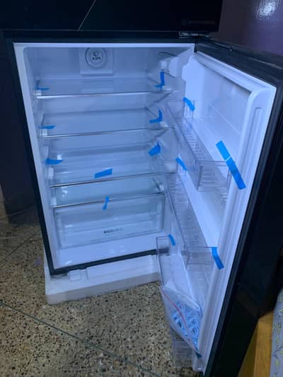 I sold my fridge brand new condition no warranty card available green