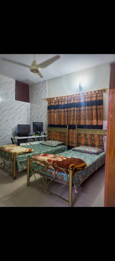 two single iron rod beds