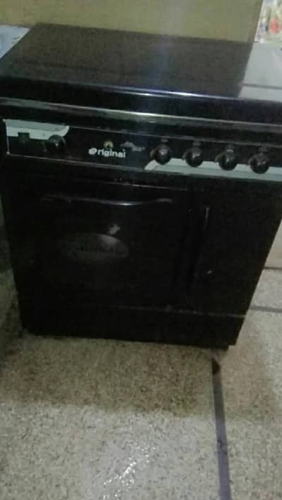 Gas stove with oven and steamer