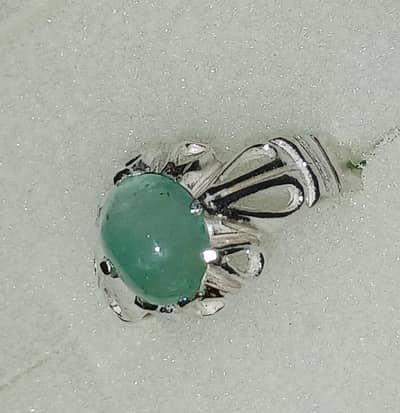Original African emerald and Feroza with silver rings.