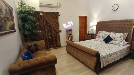 A Bed with solid wooden frame and velvet poshish is available for sale