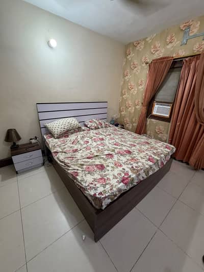 Urgent bed with side-tables for sale