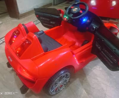 IMPORTED KIDS CAR with REMOTECONTROL & OPERABLE DOORS / All ok